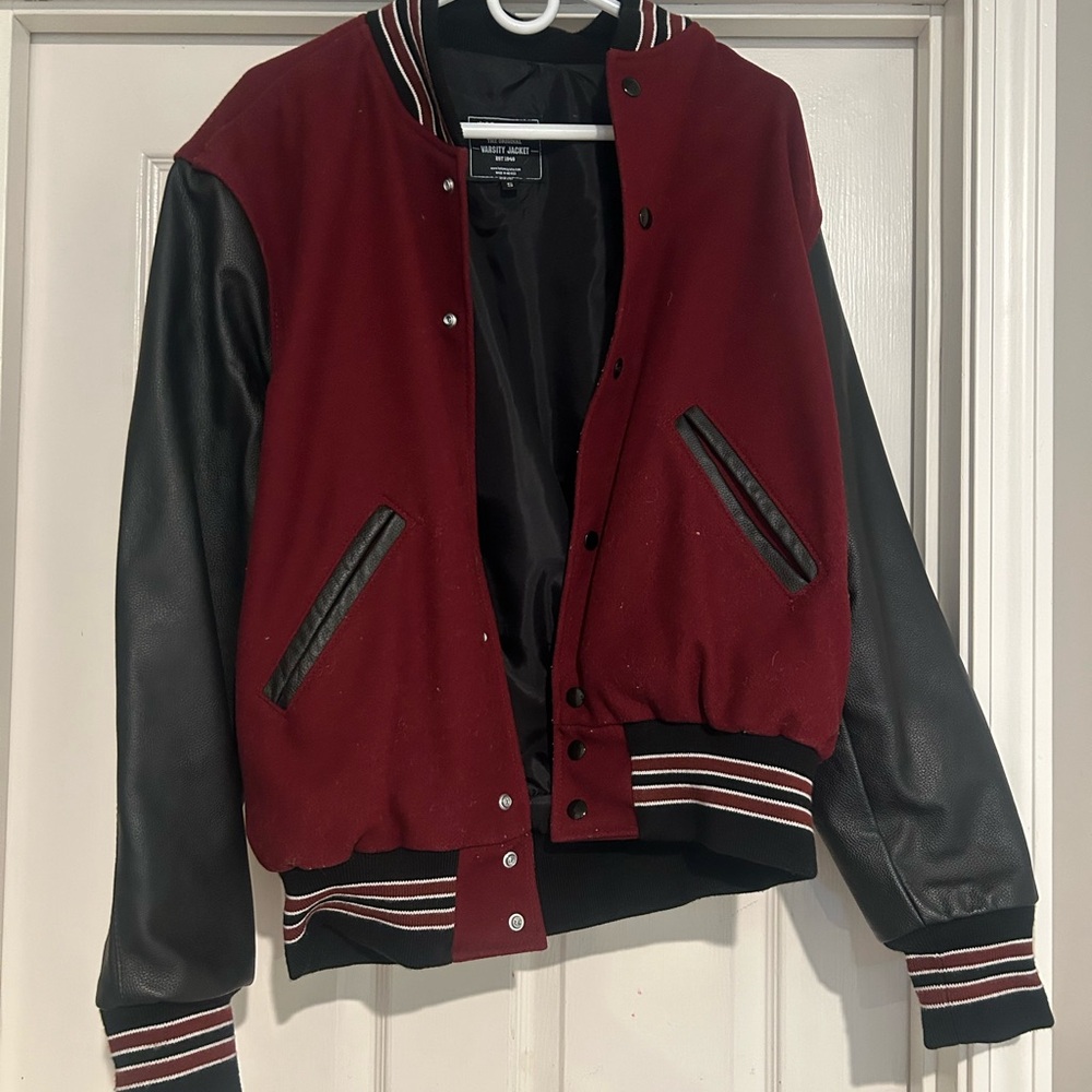 Men’s varsity jacket. Wool with leather sleeves. Maroon.
